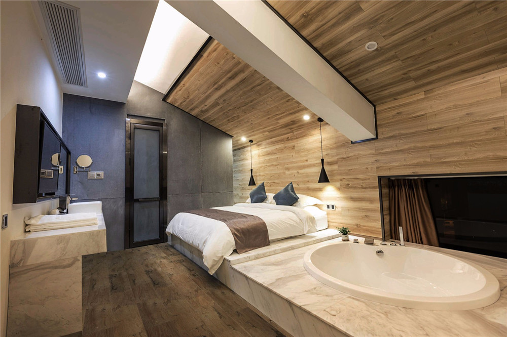 焦作九曲竹文化主題民宿酒店客房裝修設(shè)計實景圖